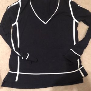 Black with white accents. Gently worn